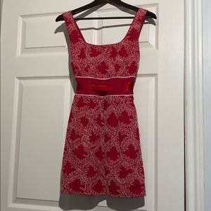 Vibrant red dress with white detailing